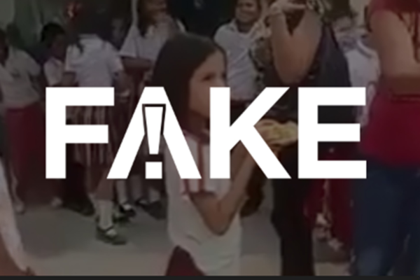 É #FAKE que vídeo de alunos posando com merenda para foto e devolvendo sem comer seja na Venezuela