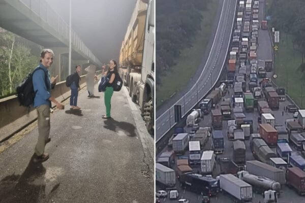 Mulher atravessa rodovia a pé para fugir congestionamento de quase 12h na Anchieta