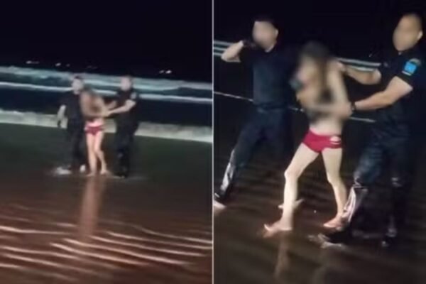 Mulher foge seminua para o mar durante surto e é resgatada por guardas no litoral de SP; VÍDEO