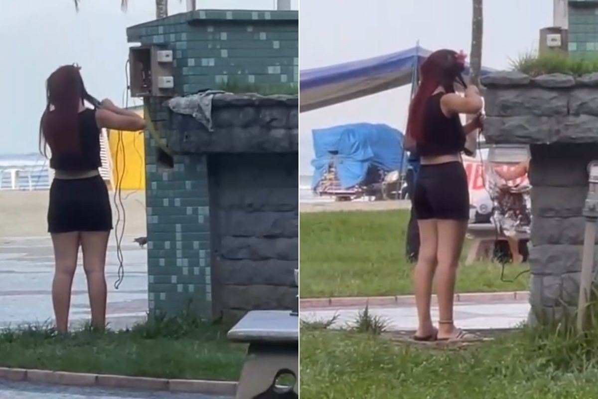 Mulher é filmada usando tomada da orla da praia de Santos, SP, para fazer chapinha no cabelo; VÍDEO